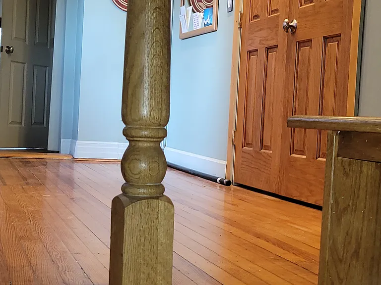 Steps to the second floor double oak doors lead to large walk in His and Hers closet. Washer Dryer laundry on the right