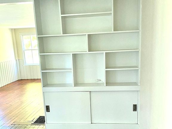 Built in bookcase in living room.