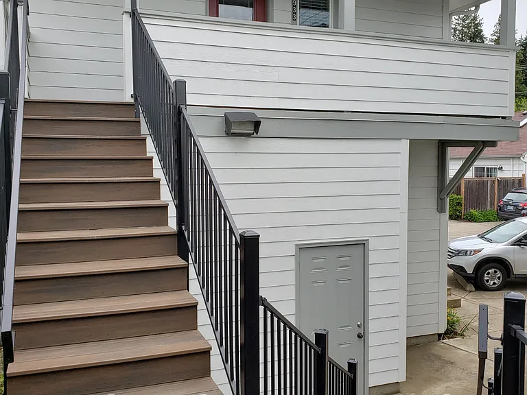 Private stairway to upper unit