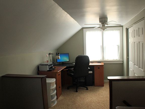 Partially divided light and comfortable upstairs loft with new carpet