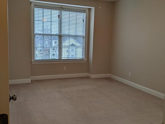 Master suite located on opposite end of unit.