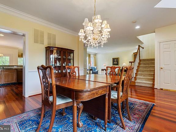 Formal Dining Room with Wide Plank Hardwood Floors