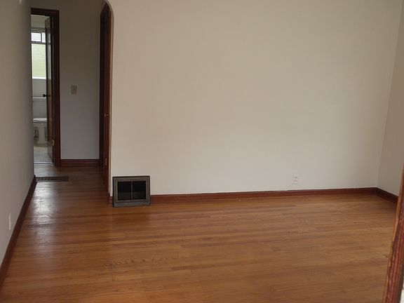 Living room looking to bathroom and bedroom.