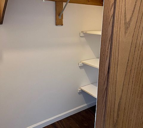 Coat closet with plenty of extra storage space