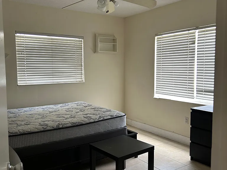 one of the three bedrooms, all rooms furnished with new queen bed sets