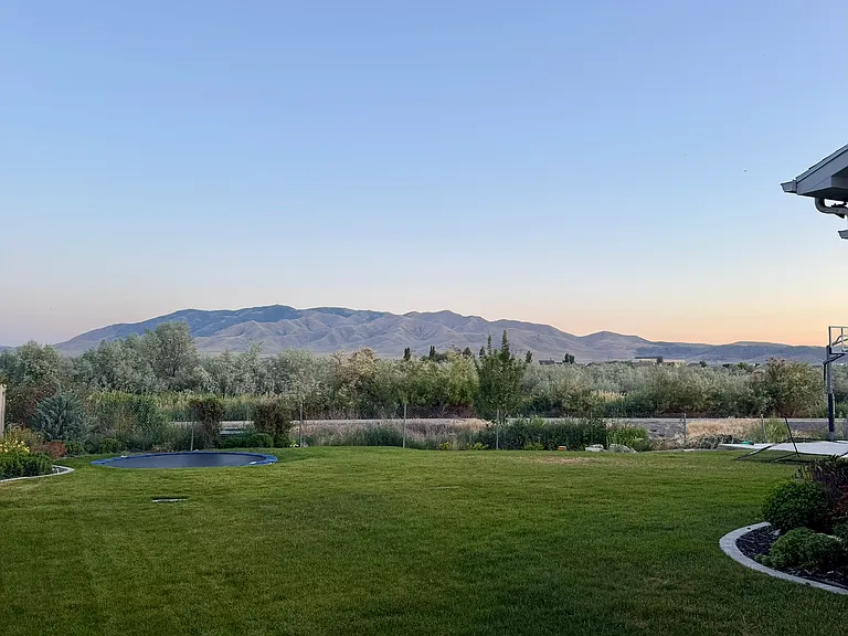 Mountain views and large yard without the yard work.