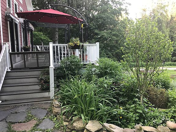 Deck and mature gardens