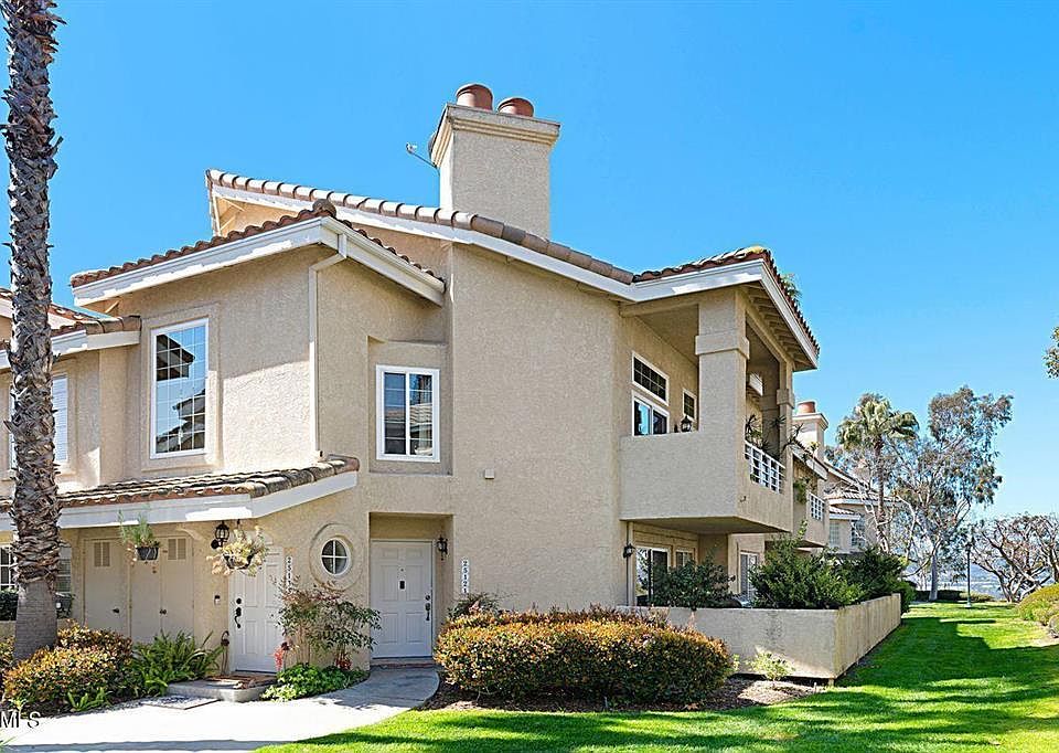 Welcome Home! Single level end unit with 2 bedrooms & 2 bathrooms and 2 car direct access garage.