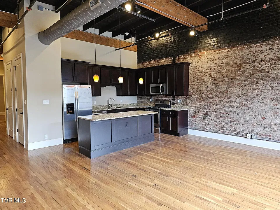 Living room looking into kitchen
