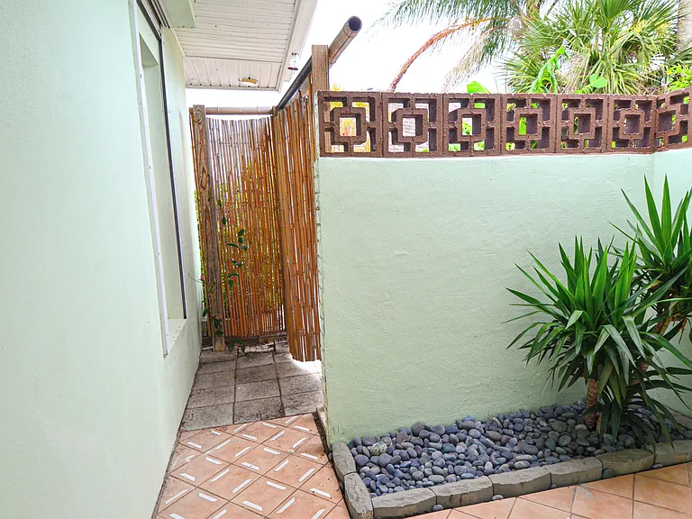 Outdoor shower off of master bathroom. Private, but accessible from outside as well. Great for washing sand from the beach