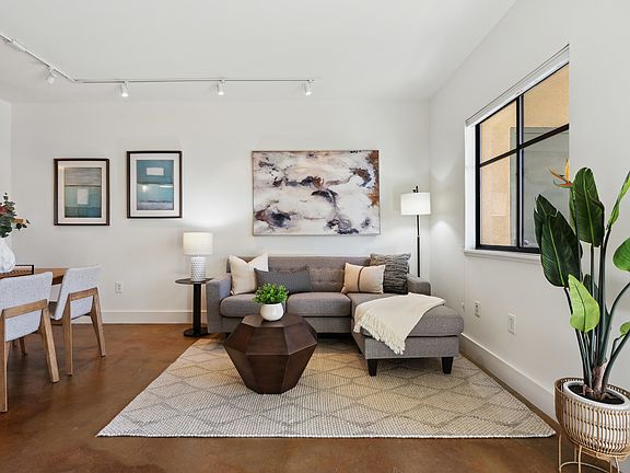 Living room with smart track lighting.