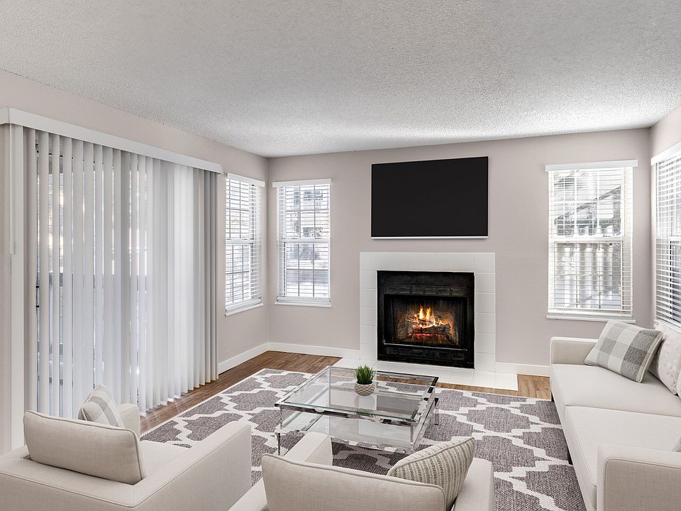 Living room fireplace at Arcadia Apartment Homes in Centennial, CO