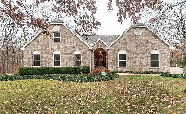 Beautiful brick elevation.  3+ acres, 3 car oversized side entry garage, 24x16 workshop.  This home has a lot to offer!
