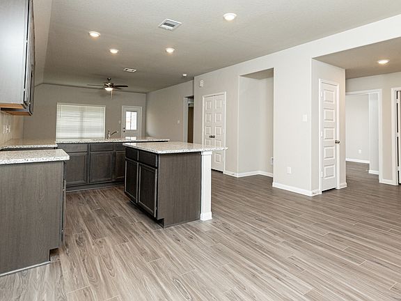 Dining Area to Kitchen and Family Room