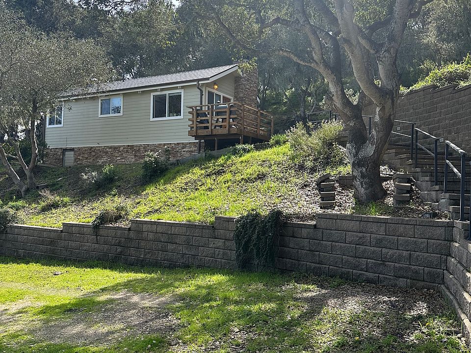 The cottage is very private, tucked into the hillside and surrounded by trees.