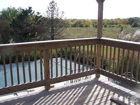 Deck overlooking pool