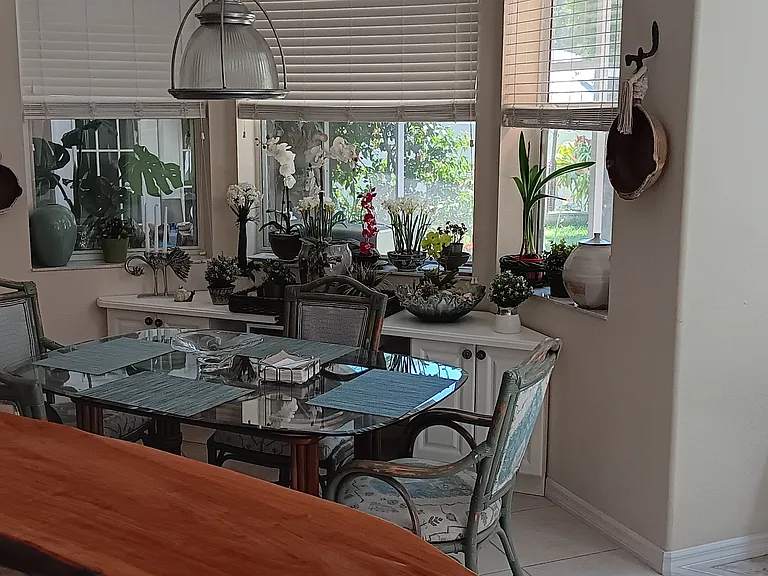 Dinette overlooking Lanai and yard