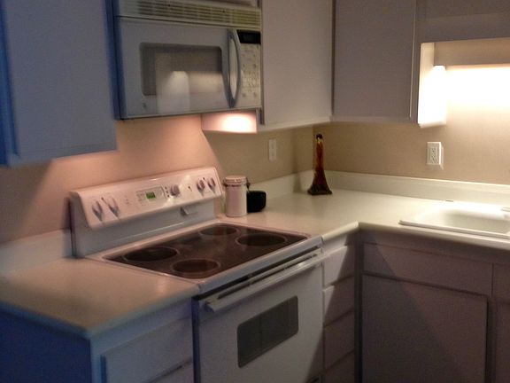 Kitchen newer appliances self cleaning oven, microwave