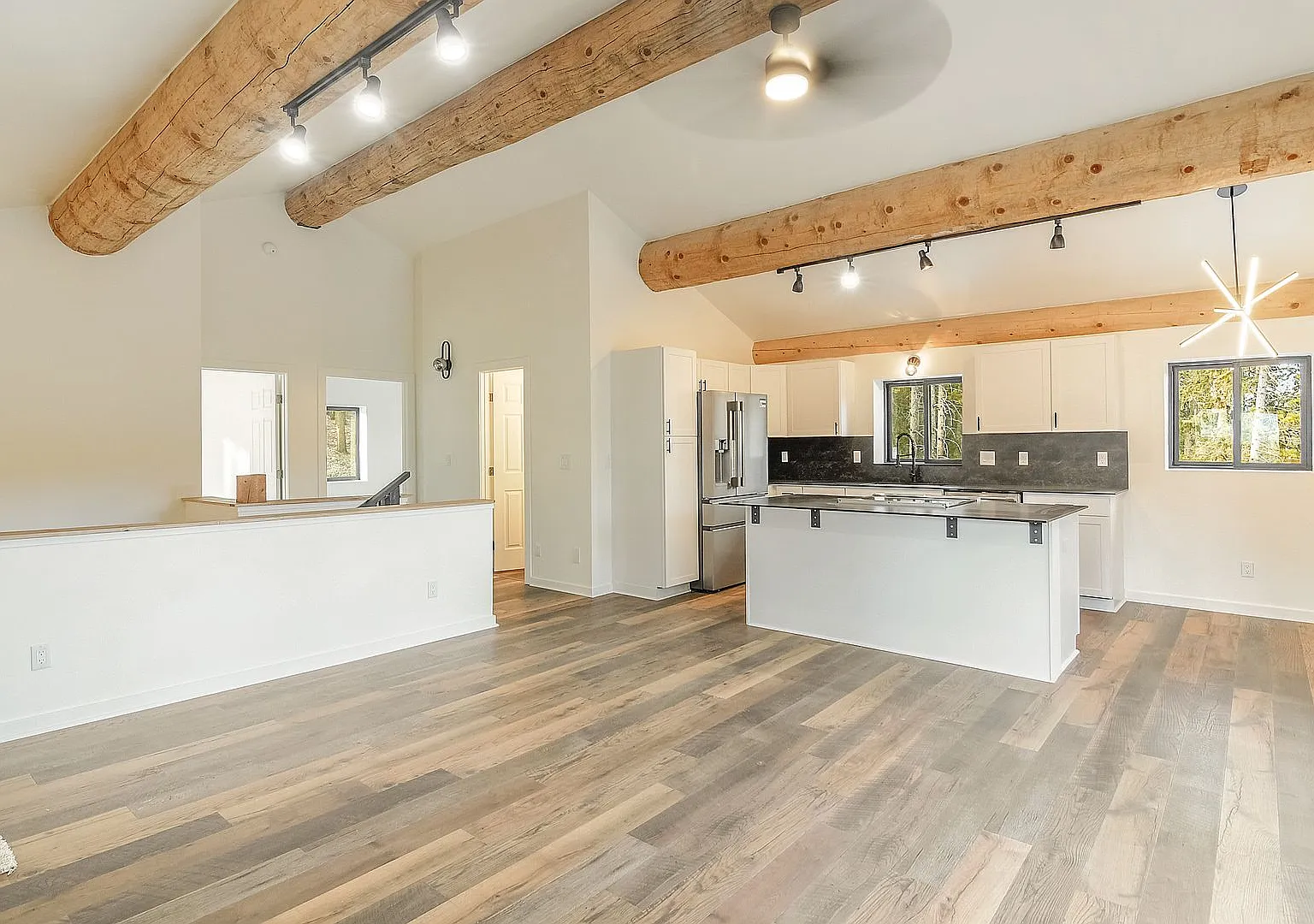 New Construction! Great Views! Deck! 20 minutes from Breck! In-floor radiant heat! — Photo 1