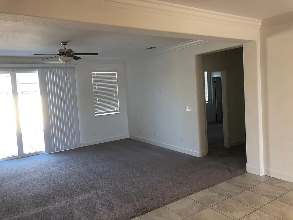 Hallway leading to 2 bedrooms and one full bath