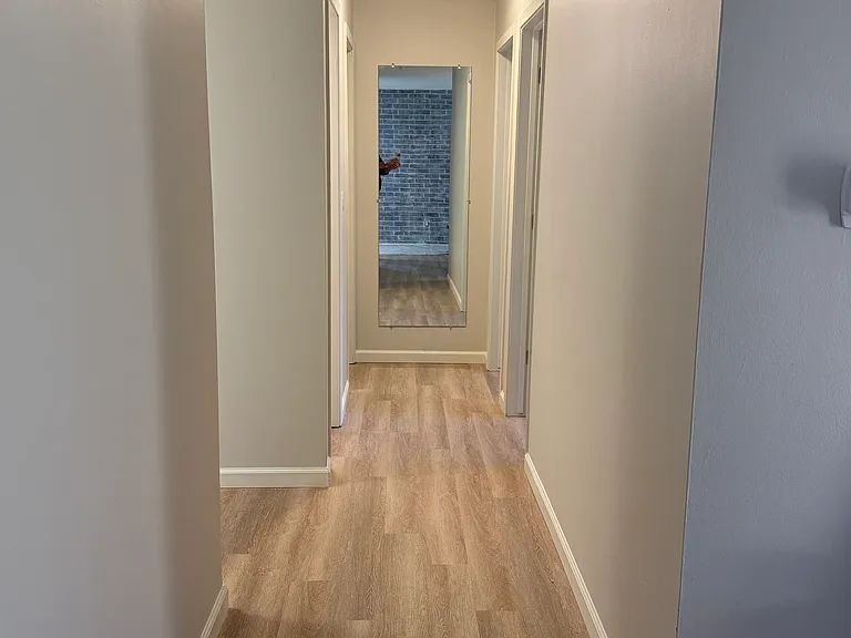 Looking from Living Room to the hallway to the Bedrooms and Bathrooms.