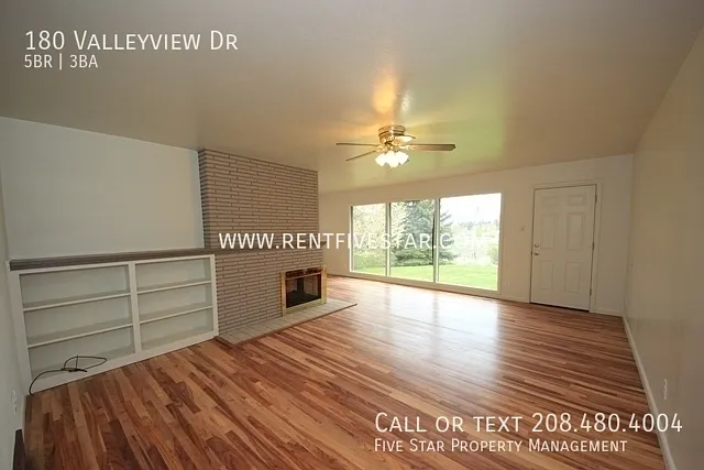 Spacious 5 Bedroom Home with Double Car Garage! — Photo 2