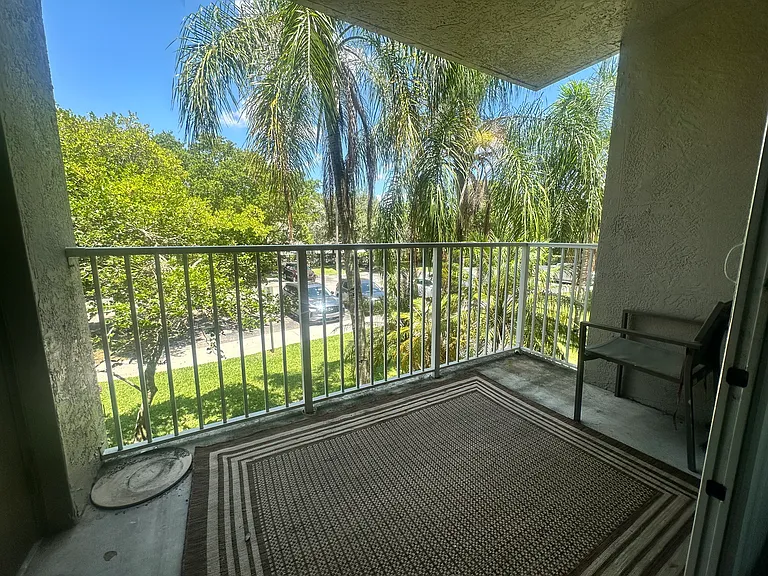 5011 Wiles Rd #207 — Photo 6