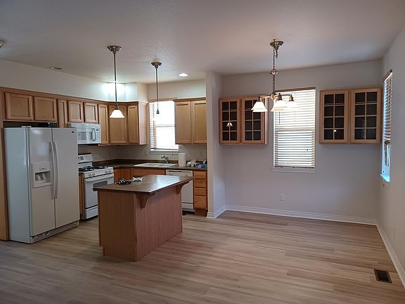 Kitchen, opposite fireplace/main living area