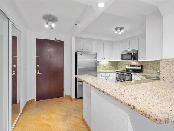 Entrance and Kitchen View of Unit 405 at The Parkshore Condominiums