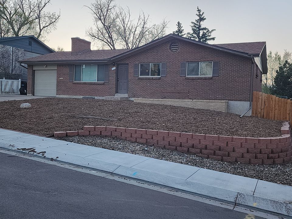 Newer windows with a low maintenance front yard. No watering and no mowing!