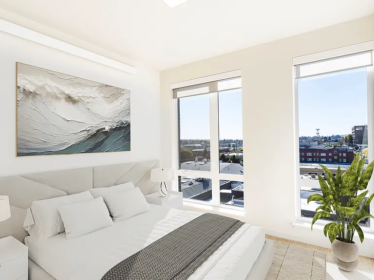 A sunlit bedroom at Modera Belmont, framed by city views and thoughtful design, just steps from Belmont's shops, cafes, and everyday favorites.