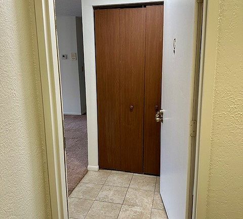 Entry of 2201 C from the hallway of the building-