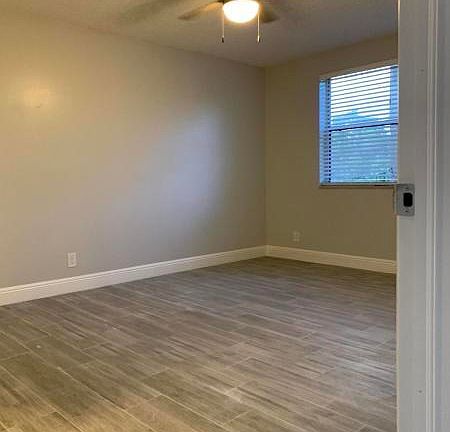 4th image of 9033 WILES Road #205