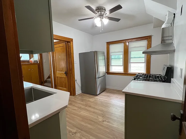 Newly remodeled kitchen with new appliances and quartz countertops