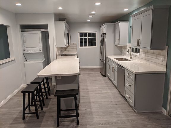 Designer kitchen with built-in laundry