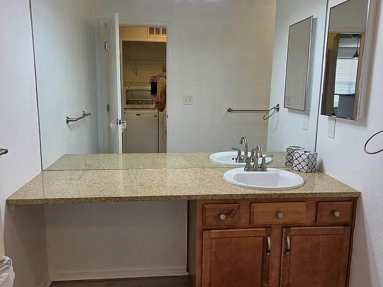 guest bathroom with large vanity, medicine cabinet and space for chair