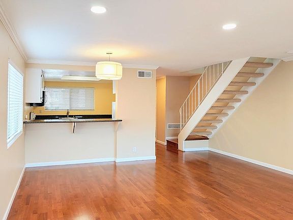 Living room and dining room with pass-through to kitchen