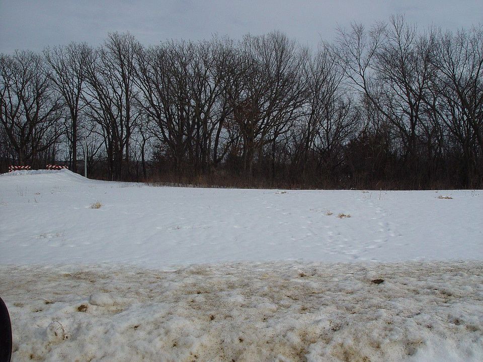 Lot view from front with woods