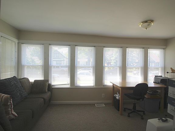 Sunny four season porch with new windows