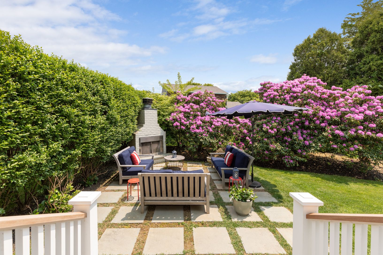  Side area with wood burning fireplace and grill 