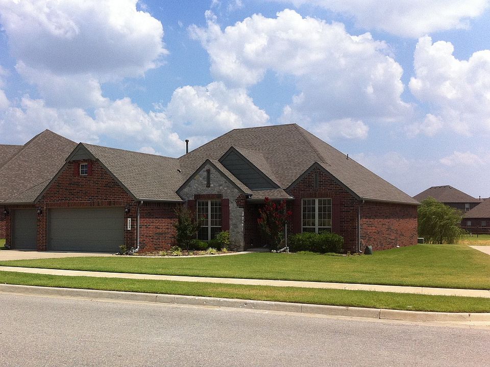 Front view, across from main pond, jogging trail access on right
