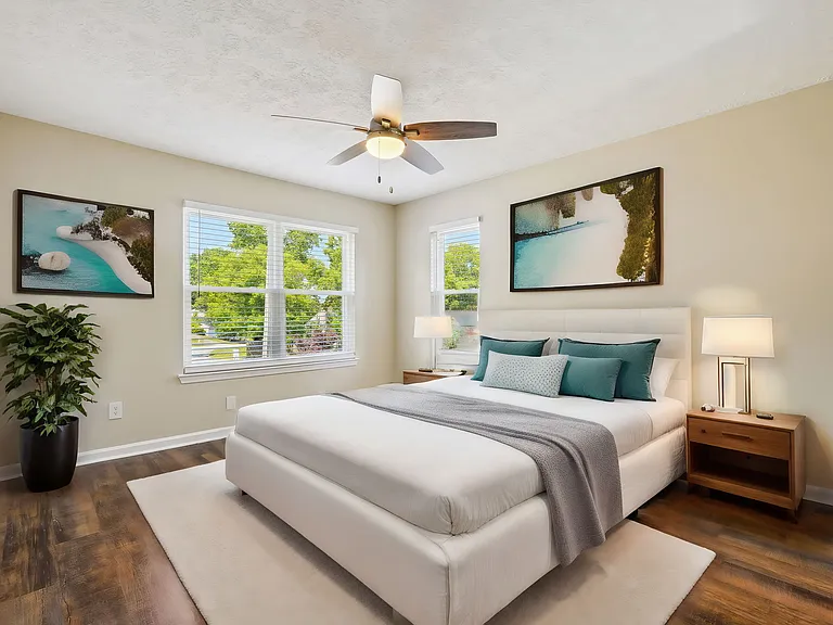 The master bedroom is spacious (staged)