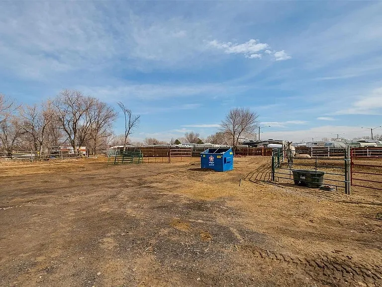 Large area to throw a frisbee or a football next to the horse corral/paddock. Campfire pit not shown.