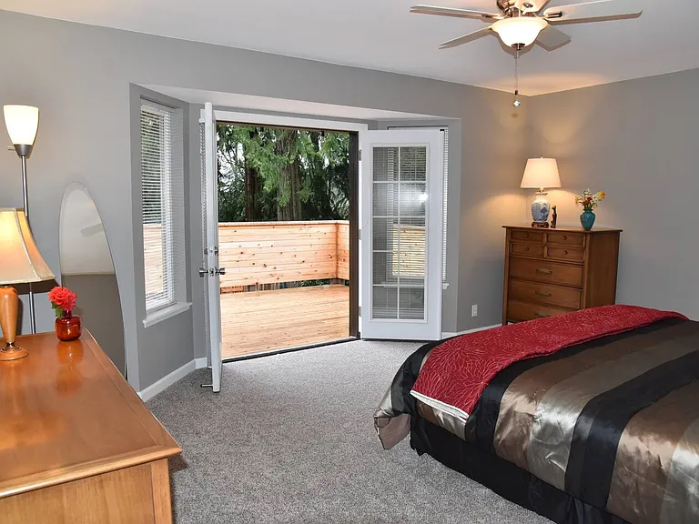 Primary Bedroom with french doors to Deck