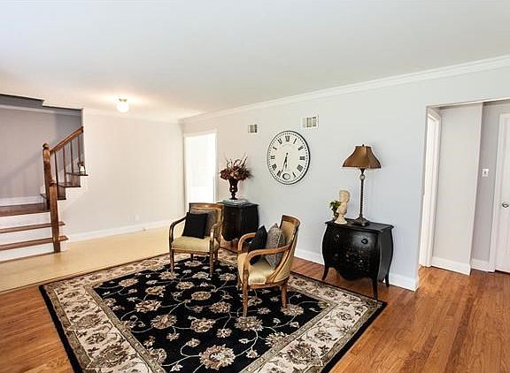 Fabulous living room with gorgeous hardwood floors.