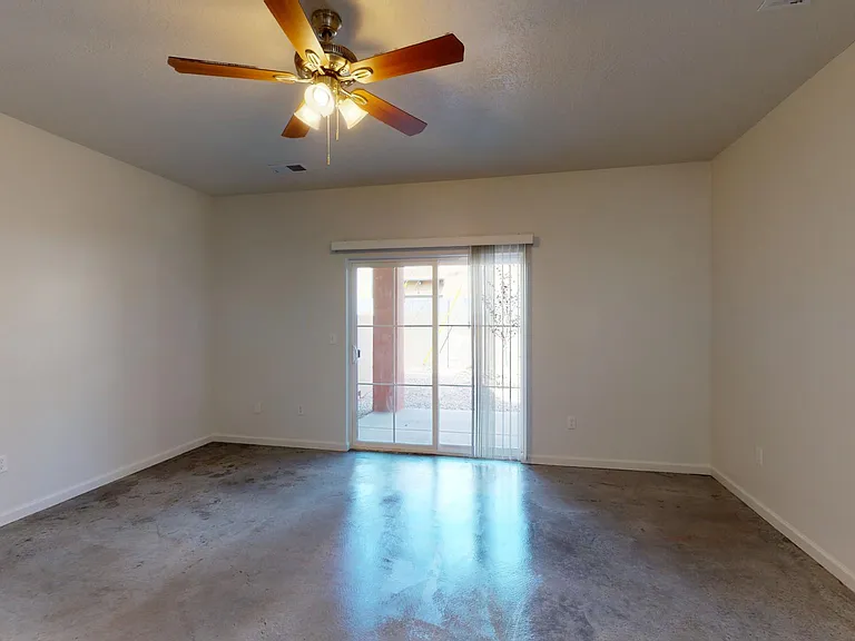 private backyard with 6' block walls and covered patio