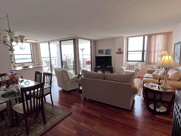 Sitting area with hardwood floors overlooking the bay