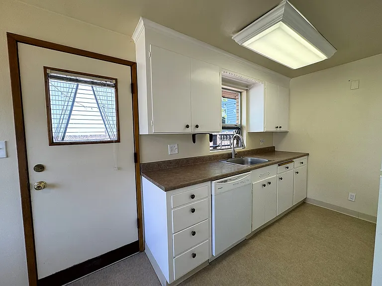 Kitchen with door to deck area