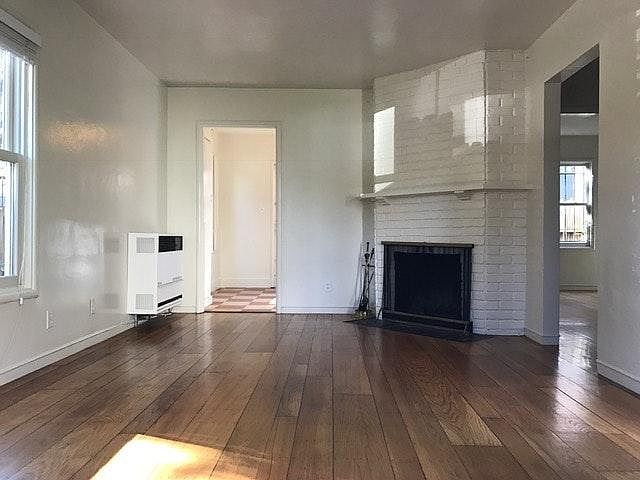 Hardwood floors and fireplace