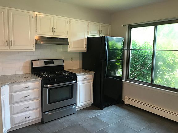 Large window makes the kitchen sunny and bright.
